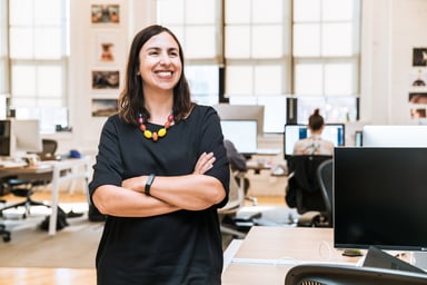 smiling-businesswoman-in-office_4460x4460.jpg